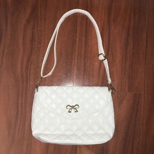 White bow cross body purse